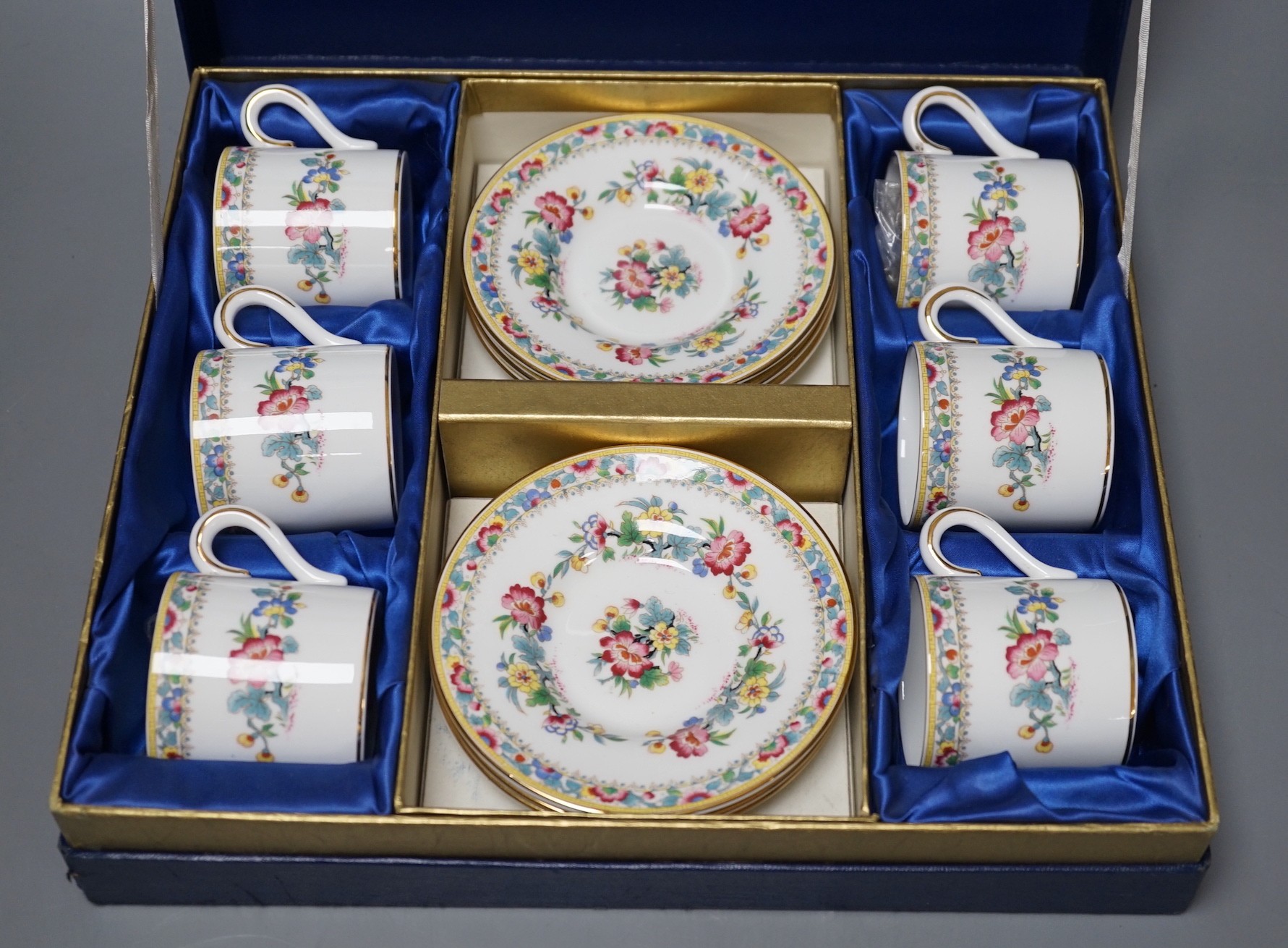 A Coalport floral coffee set, boxed